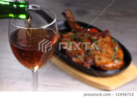 Pouring white wine Pouring white wine 32698728
