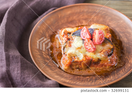 Portion of parmigiana di melanzane 32699131