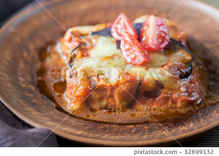 Portion of parmigiana di melanzane 32699132