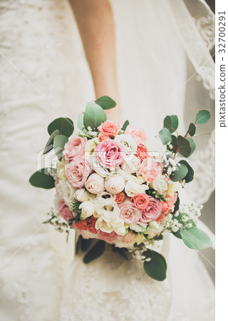 Pretty good wedding bouquet of various flowers in 32700291