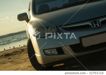 Car on the background of the river 32701118