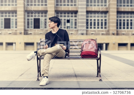 Asian man reading book relaxation 32706736