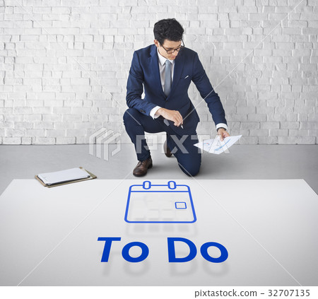 Man planning with illustration of personal organizer calendar 32707135