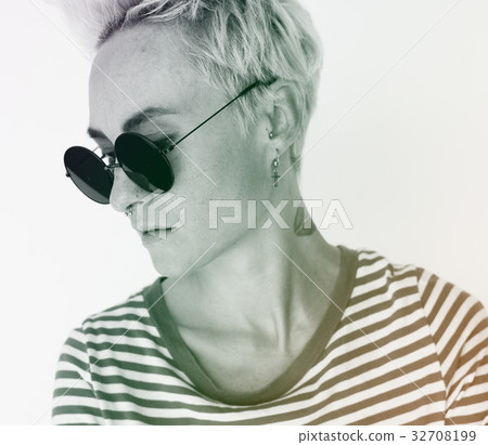 Woman standing and posing for picture Woman standing and posing for picture 32708199