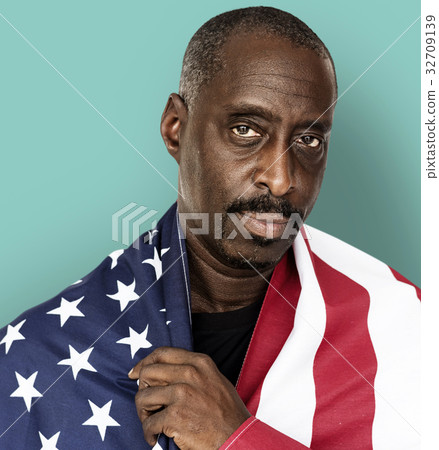 Adult Man Covered with American Flag Nationality Studio Portrait Adult Man Covered with American Flag Nationality Studio Portrait 32709139
