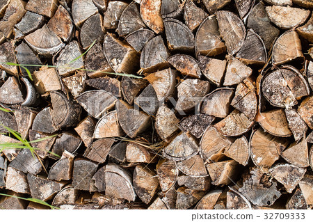 pile of old firewood for background. pile of old firewood for background. 32709333