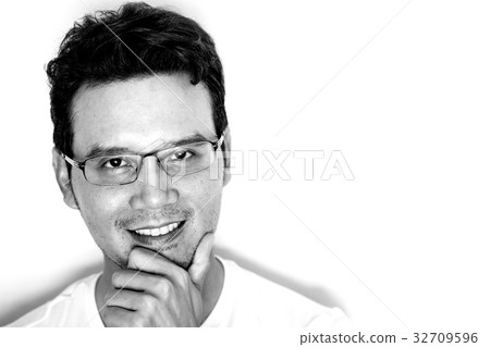 Asian man smiling and feeling happy Asian man smiling and feeling happy 32709596