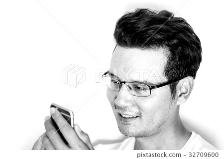 Man using smartphone with smile and happy 32709600