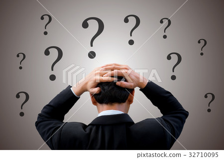 Businessman feeling confuse with many questions Businessman feeling confuse with many questions 32710095