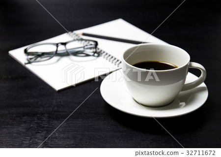 Coffee with notebook ,glasses and pencil Coffee with notebook ,glasses and pencil 32711672