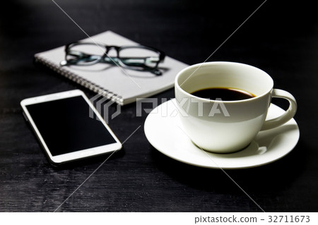 Coffee with notebook ,glasses and mobile phone Coffee with notebook ,glasses and mobile phone 32711673