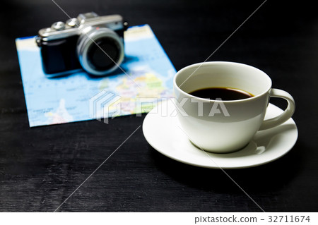 Coffee with camera and world map Coffee with camera and world map 32711674