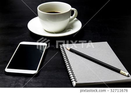 Coffee with notebook ,pencil and mobile phone Coffee with notebook ,pencil and mobile phone 32711676