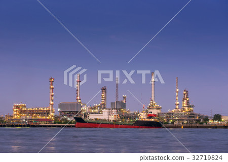 Oil refinery and loading dock station at twilight 32719824