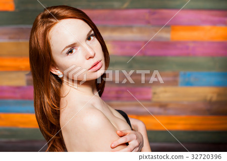 attractive cute girl with red hair 32720396