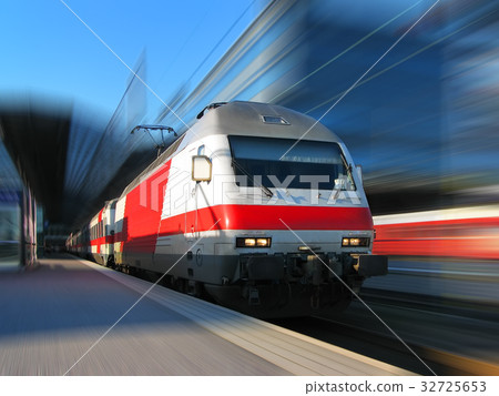 High-speed train in motion High-speed train in motion 32725653