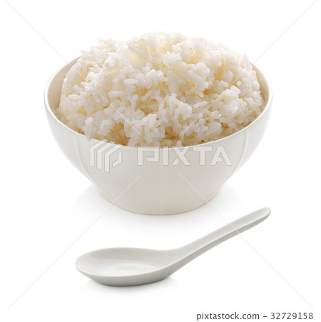 rice in a bowl and ceramic spoon isolated on white rice in a bowl and ceramic spoon isolated on white 32729158