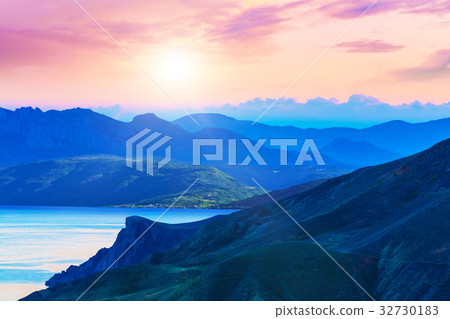 Scenic sunset in mountains Scenic sunset in mountains 32730183