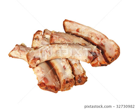 Heap of picked pork ribs bones isolated on white. Heap of picked pork ribs bones isolated on white. 32730982