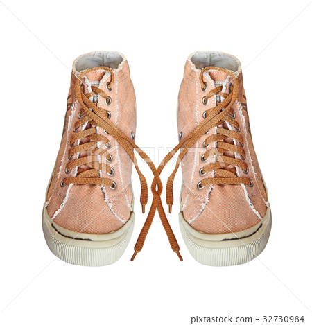 Pair of Trendy Fabric Gym shoes isolated on white. 32730984
