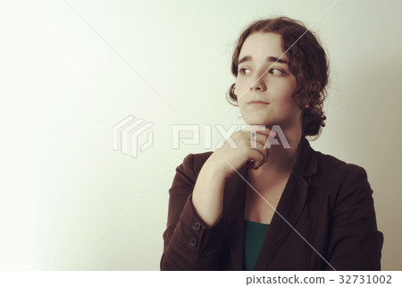 young thoughtful woman pensive wondering looking 32731002