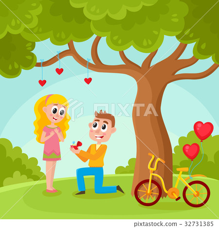 Young man proposing to pretty girl in park 32731385