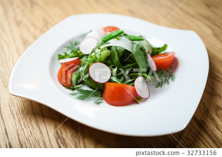 fresh salad on a plate 32733156