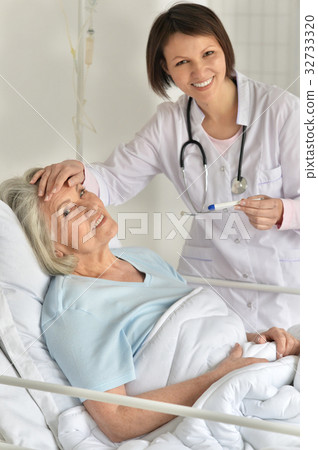 doctor taking care of patient doctor taking care of patient 32733320