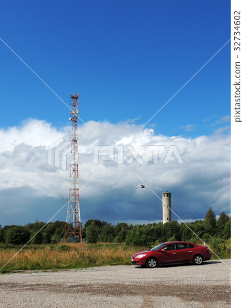 Mobile communications tower and old water tower Mobile communications tower and old water tower 32734602