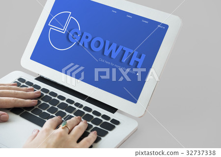 Hands working on laptop network graphic overlay 32737338