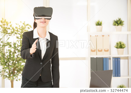 asian business woman showing handshake gesture asian business woman showing handshake gesture 32744474
