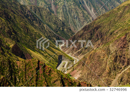 Mountain road through the pass. Kyrgyzstan. Mountain road through the pass. Kyrgyzstan. 32746996