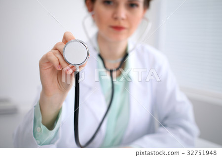 Doctor with a stethoscope in the hands 32751948