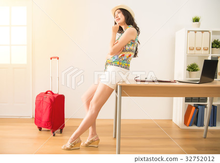 woman thinking her daydream holiday 32752012