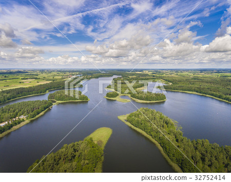 Aerial view of green islands on the lake in Poland Aerial view of green islands on the lake in Poland 32752414