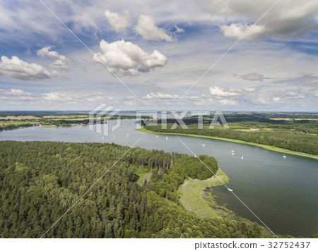 Aerial view of green islands on the lake in Poland Aerial view of green islands on the lake in Poland 32752437