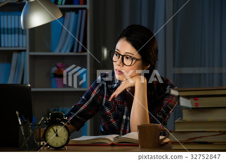 bored female college student studying bored female college student studying 32752847