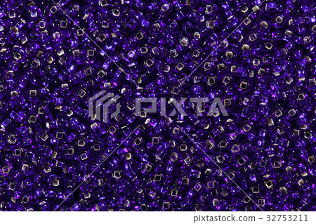 Variety of purple seed beads. Variety of purple seed beads. 32753211