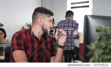 Thoughtful designer working on architectural 32753522