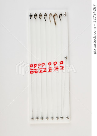 Fishing hooks on white background. 32754267
