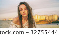 Beautiful girl crying at sunset 32755444