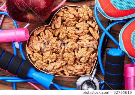 Walnut, stethoscope, sneakers and apple. Walnut, stethoscope, sneakers and apple. 32755619