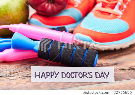 Sneakers, jump rope and card. 32755690