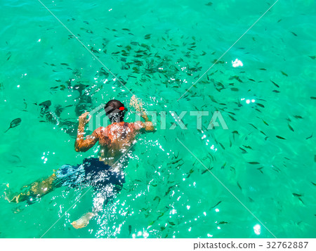 Tourist snorkeling in Andaman sea at Ko Kradan Tourist snorkeling in Andaman sea at Ko Kradan 32762887