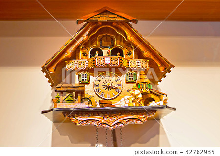 The detail of swiss wooden clock 32762935