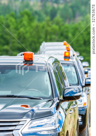 Cortege of black suvs 32763678