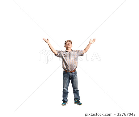 Portrait of a mature man raise his arm to above Portrait of a mature man raise his arm to above 32767042