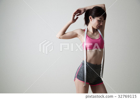 Woman diet young woman gray back fitness sport Woman diet young woman gray back fitness sport 32769115