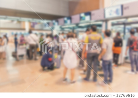 blurred of Traveler Check in at airport terminal 32769616
