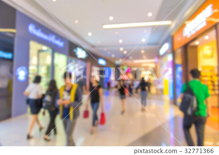 blur People Walking in corridor of business center blur People Walking in corridor of business center 32771366